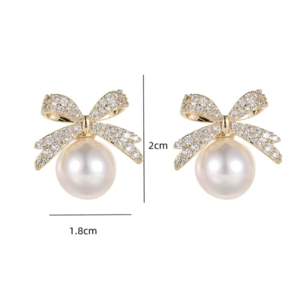 Anthropologie Classic Pearl Bow Gold Earrings - Picture 4 of 5